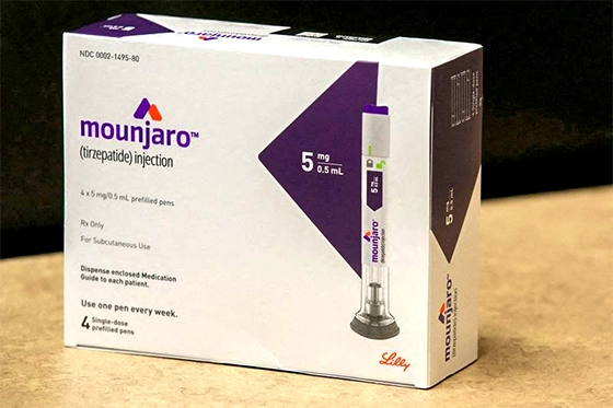 Box of Mounjaro injection pens with dosage and branding visible.